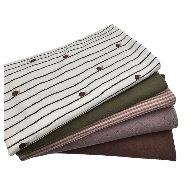 Stoffbox Jersey Schnecken mit Steppsweat und Bündchen