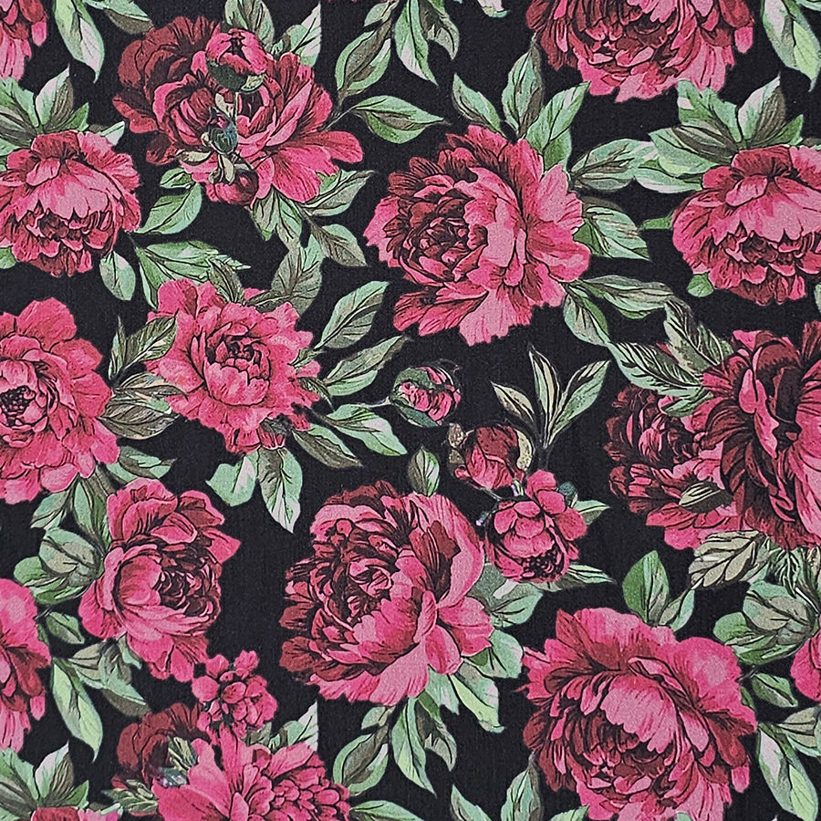 Baumwollsatin Blumen schwarz und rosa