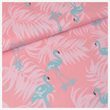Baumwollstoff Flamingos auf Blättern rosa